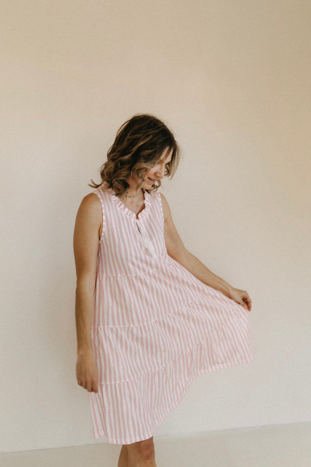 Kleid gestreift im Stufenlook – Rosa/Creme
