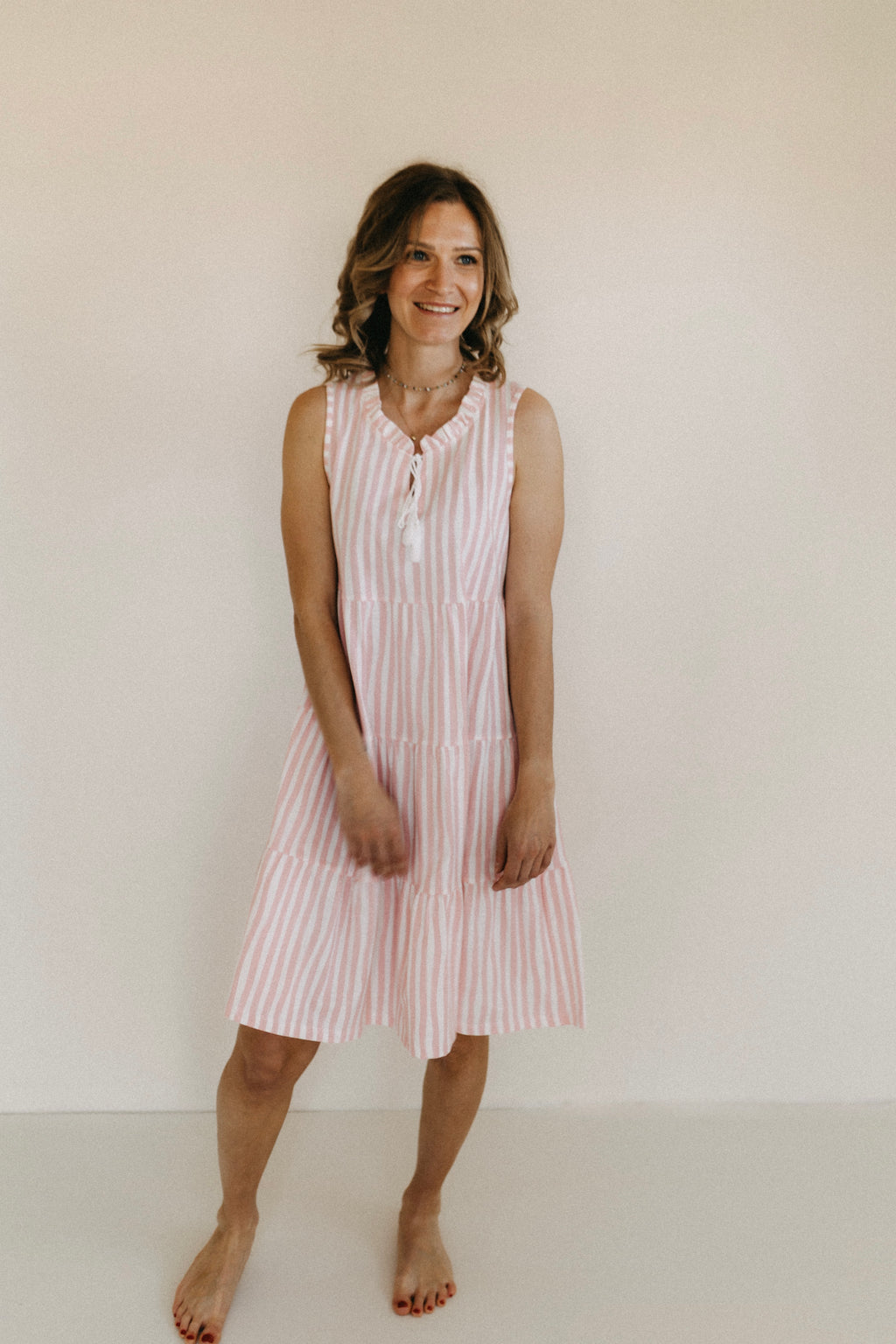 Kleid gestreift im Stufenlook – Rosa/Creme