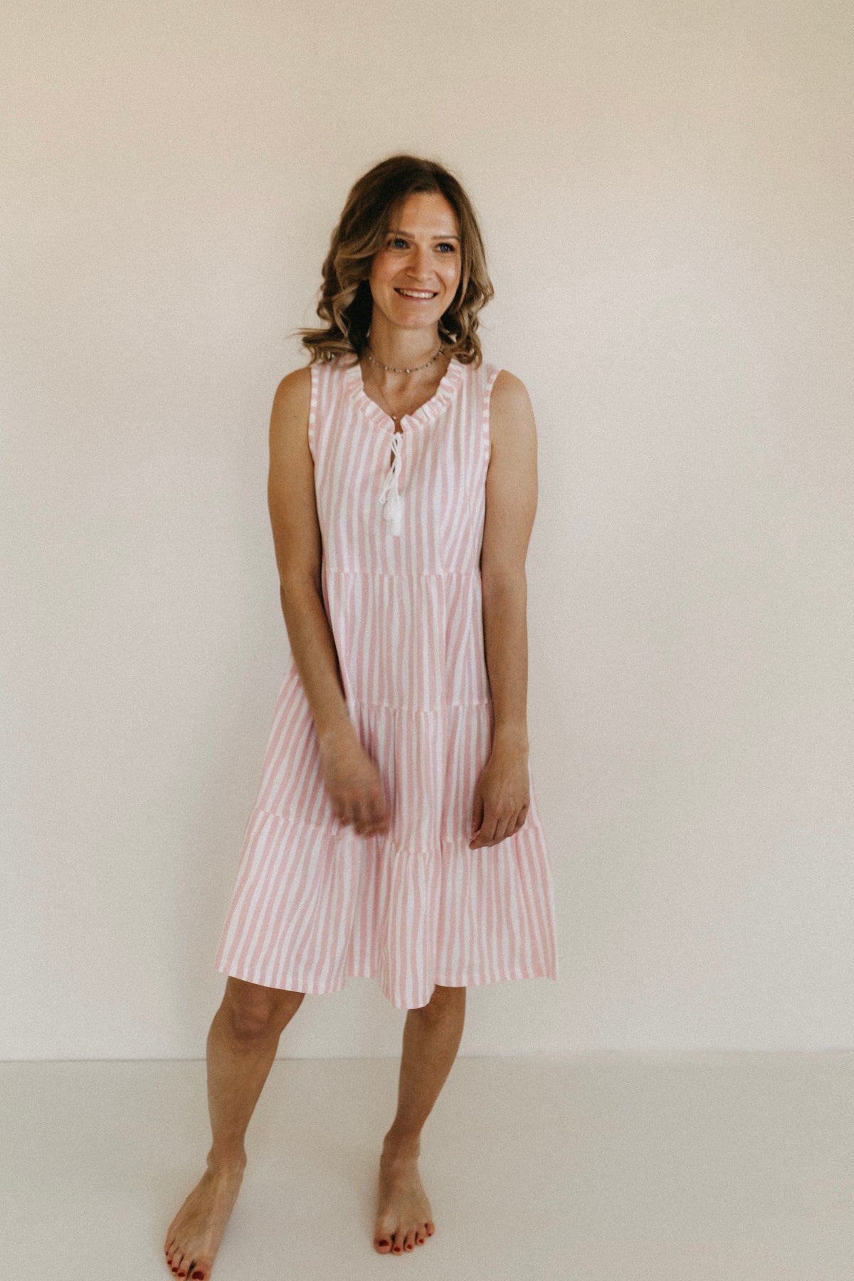 Kleid gestreift im Stufenlook – Rosa/Creme
