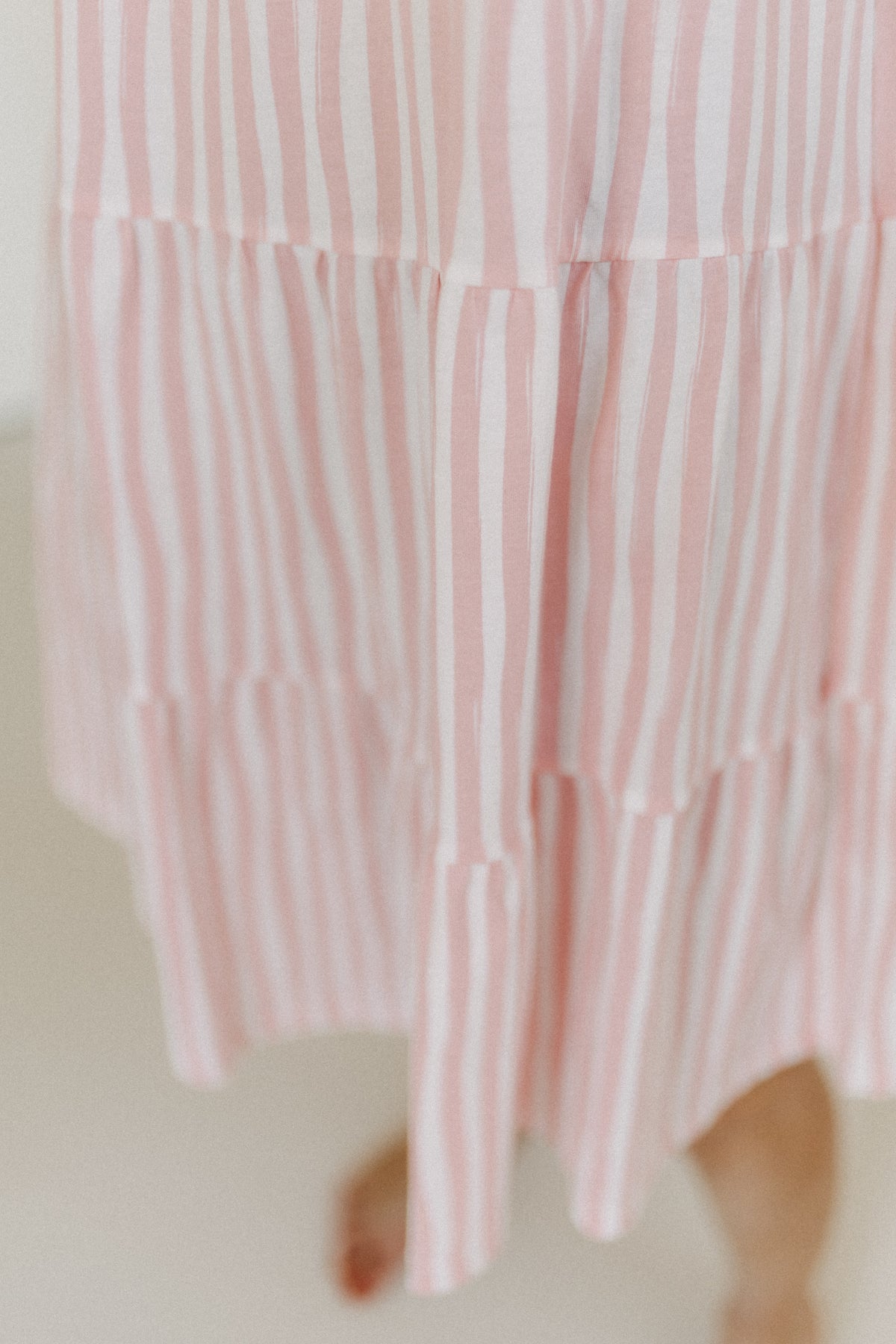 Kleid gestreift im Stufenlook – Rosa/Creme